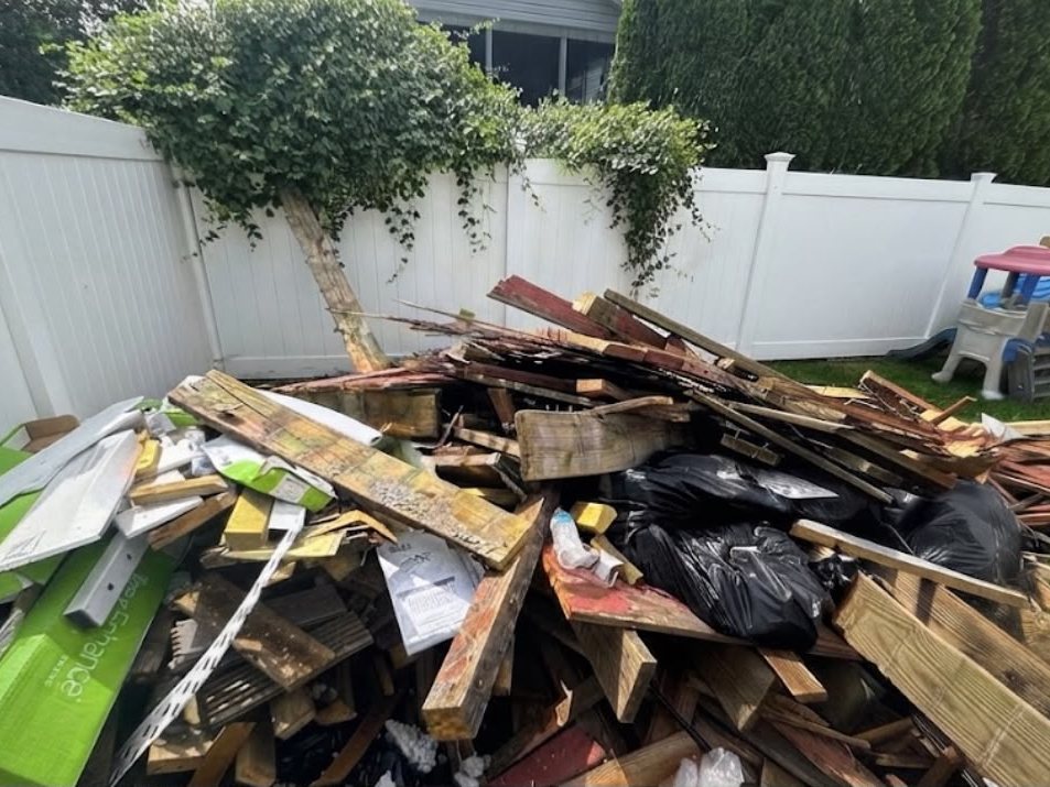 Demolition debris neatly piled for cleanup